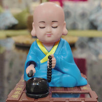 Solar Powered Gautam Buddha Statue with Moving Head and Hand for decor Decorative Showpiece